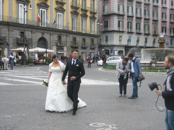 Bride and groom in Naples with their camera and video crew.