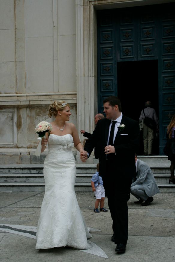 Happy couple in Positano leaving the church.