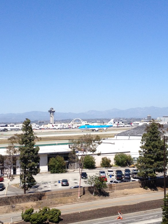 A KLM 747 taxis on the runway at LAX.