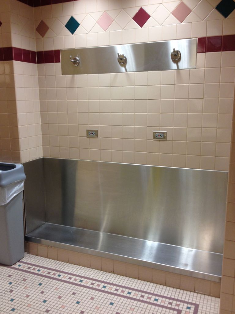 COS Colorado Springs airport bathroom shelf and coat rack