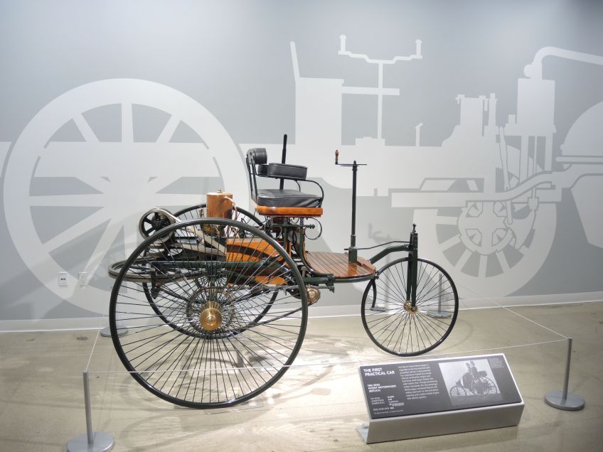 The first practical car an 1886 Benz Patent Motorwagen replica at the Petersen Automotive Museum seen with LA F1 Fans