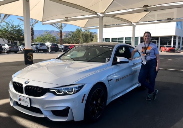 BMW Performance Driving School driving a BMW M4 on the track with Kiera Reilly for A Girl's Guide to Cars #Drive2Learn conference
